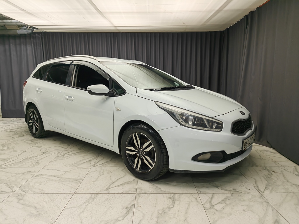 Купить Kia Ceed 2014 цена от 650000 в Новосибирске, в автосалоне Гепард  №170502